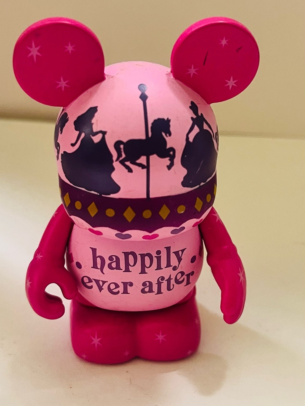 Disney Pink Vinyl Theme Park Figure with Purple Text
